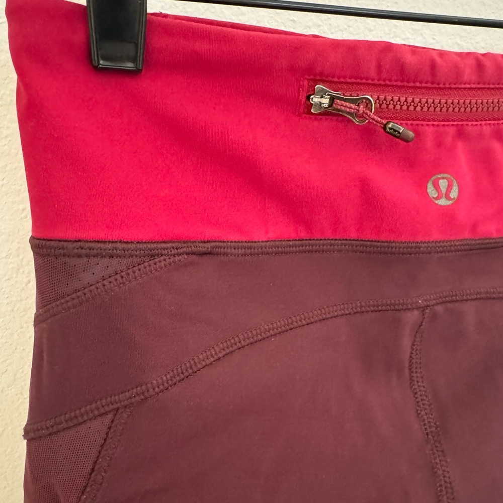 Women’s Lululemon burgundy/magenta capris leggings, Size 4